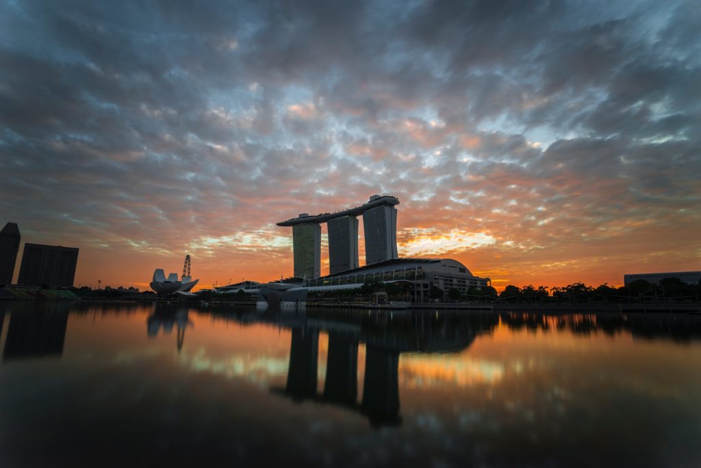 singapore skyline at sunset from the water