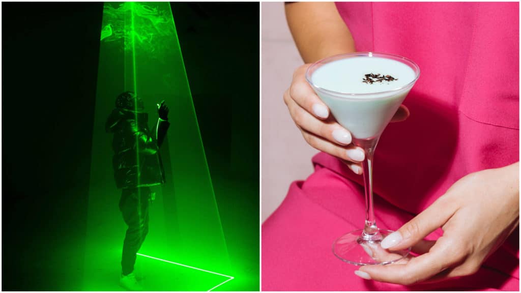 A person surrounded by green lasers and a person holding a white cocktail.